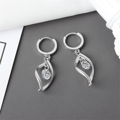 Crystal and Silver-Plated Twisted Drop Huggie Earrings, silver huggie earrings, vintage-inspired design, lifestyle look
