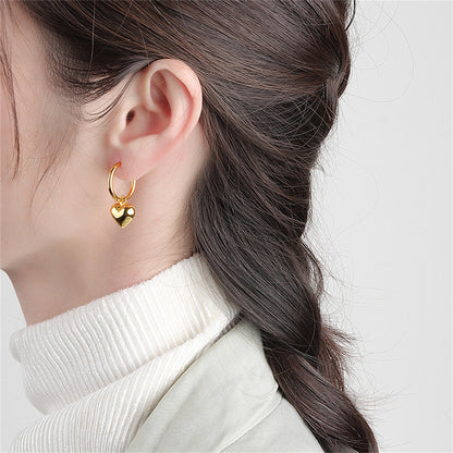 18K Gold-Plated Heart Huggie Earrings, gold huggie earrings, vintage-inspired design, detail close-up