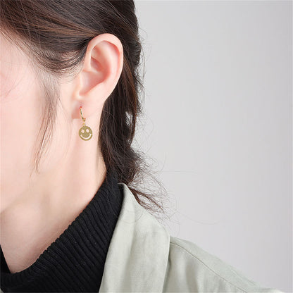 18K Gold-Plated Smiley Huggie Earrings, gold huggie earrings, everyday style, detail close-up