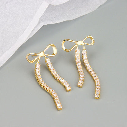 Cubic Zirconia and 18K Gold-Plated Bow Tassel Drop Earrings, gold drop earrings for women, detail close-up
