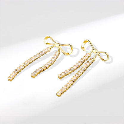 Cubic Zirconia and 18K Gold-Plated Bow Tassel Drop Earrings, gold drop earrings for women, lifestyle look