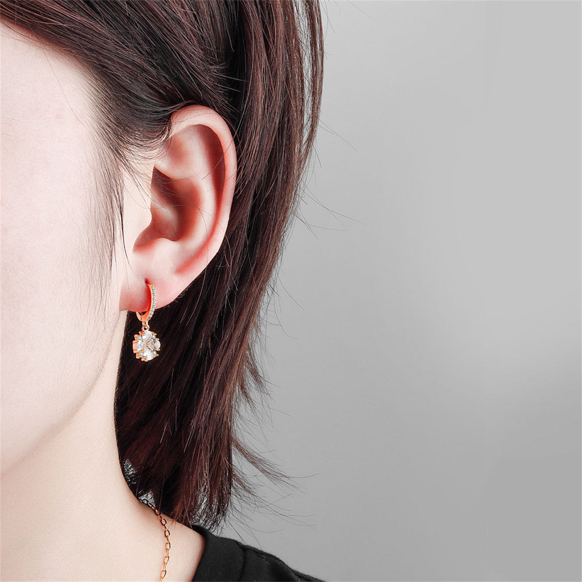 Crystal and 18K Gold-Plated Flower Huggie Earrings, gold huggie earrings, everyday style, detail close-up