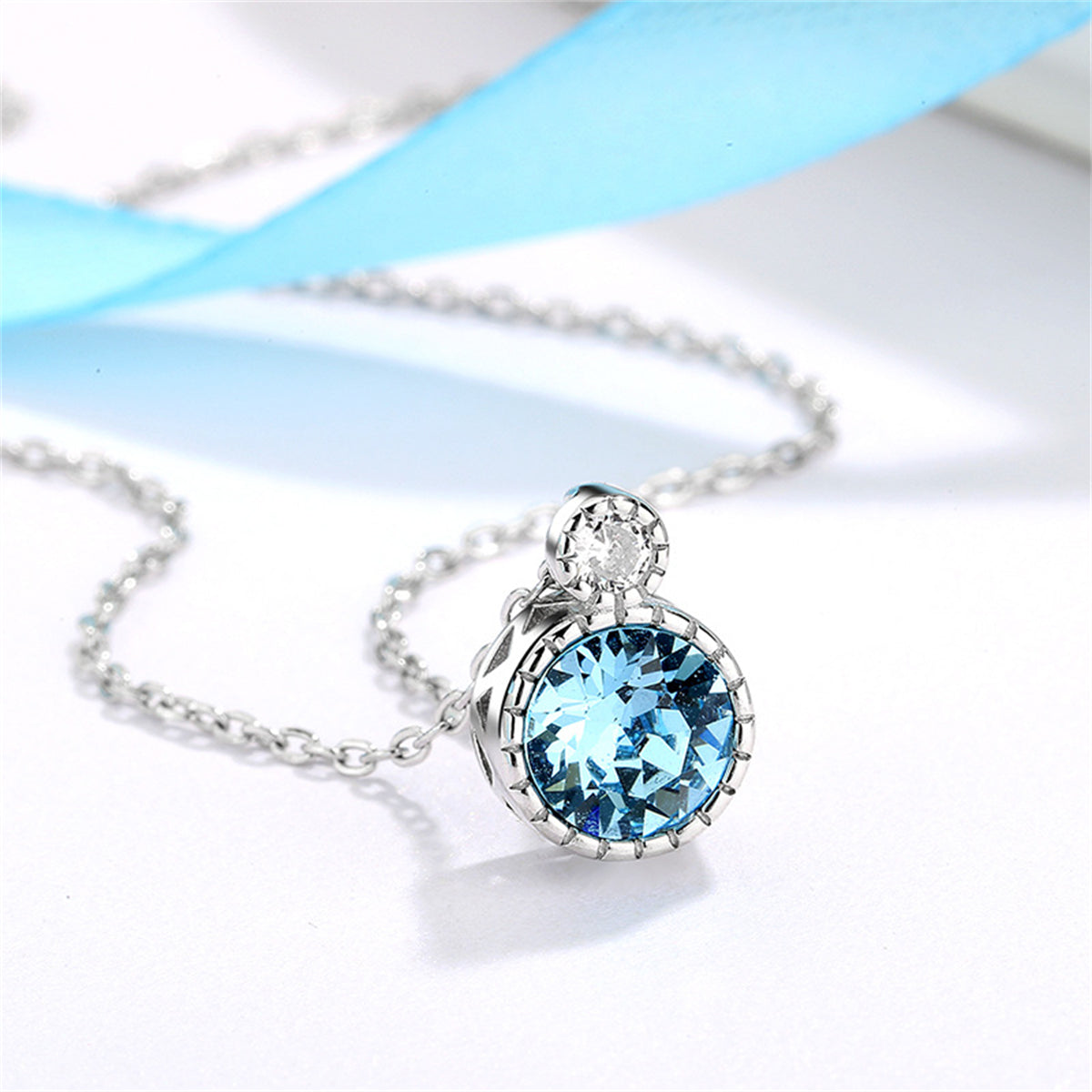 Blue Crystal and Silver-Plated Round Pendant Necklace, silver pendant necklace for women, elegant gift for her, front view