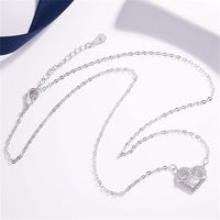Cubic Zirconia & Silvertone Swirl Heart Pendant Necklace