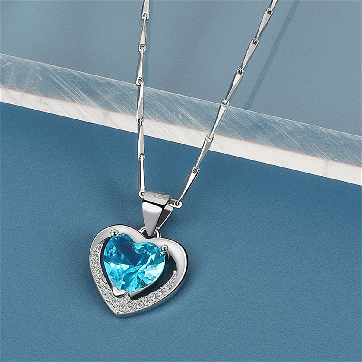 Blue Crystal and Cubic Zirconia Heart Pendant Necklace, pendant necklace for women, botanical inspired, front view