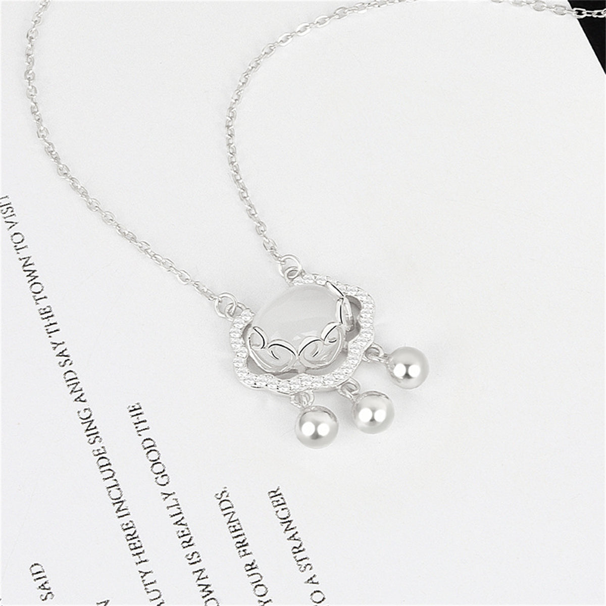 Cubic Zirconia and Quartz Silver-Plated Lock Of Longevity Pendant Necklace, silver pendant necklace for women, front view