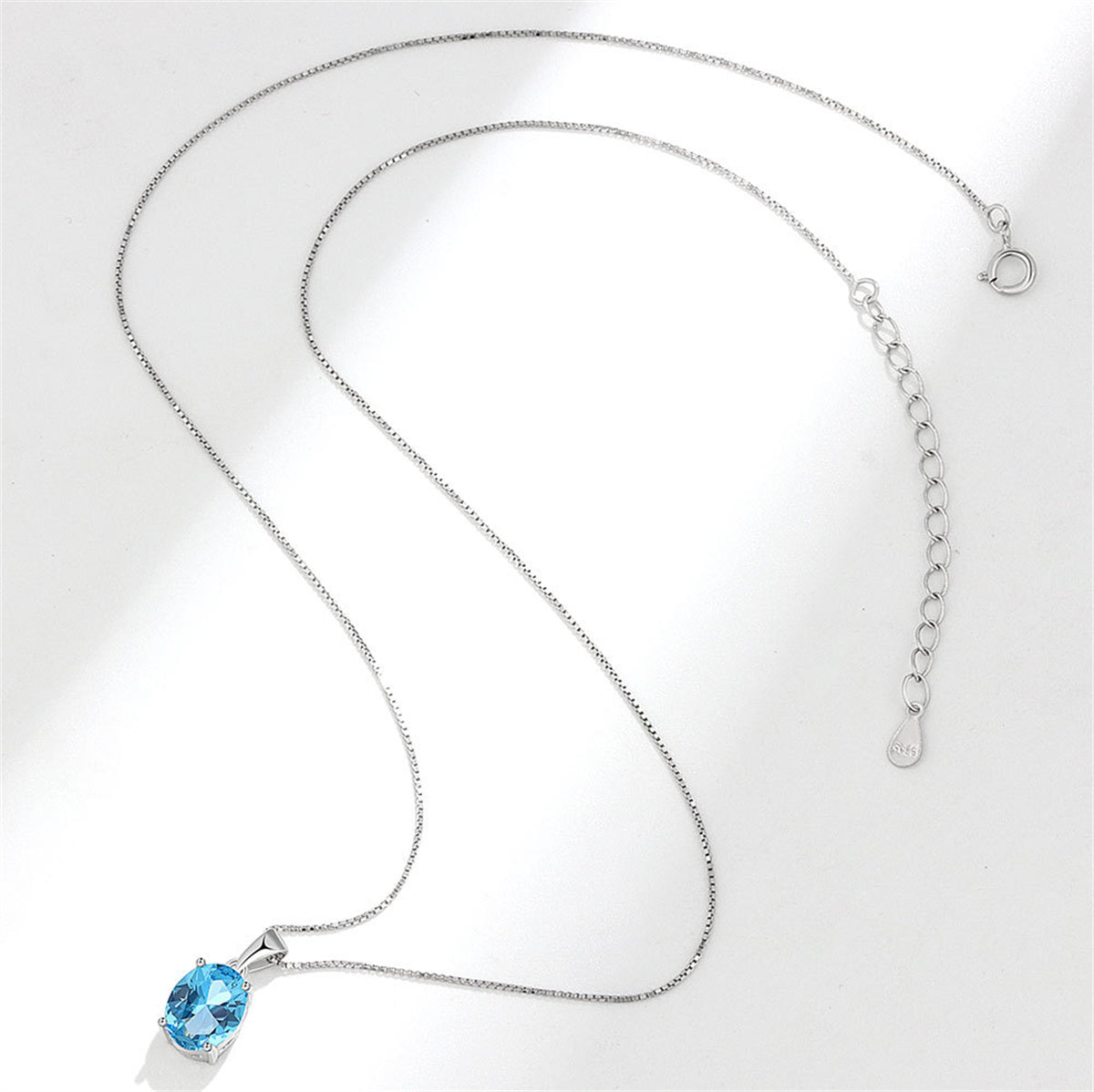 Blue Crystal and Silver-Plated Oval Pendant Necklace, silver pendant necklace for women, botanical inspired, lifestyle look