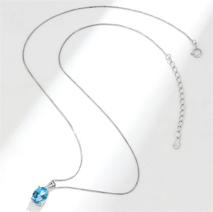 Blue Crystal and Silver-Plated Oval Pendant Necklace, silver pendant necklace for women, botanical inspired, lifestyle look
