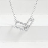 Cubic Zirconia & Silvertone Interlock Rectangles Pendant Necklace