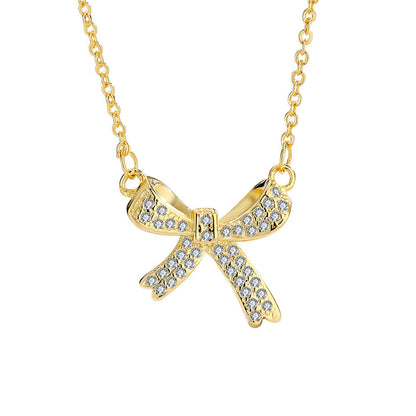 Cubic Zirconia and 18K Gold-Plated Bow Pendant Necklace, gold pendant necklace for women, vintage-inspired design, side view