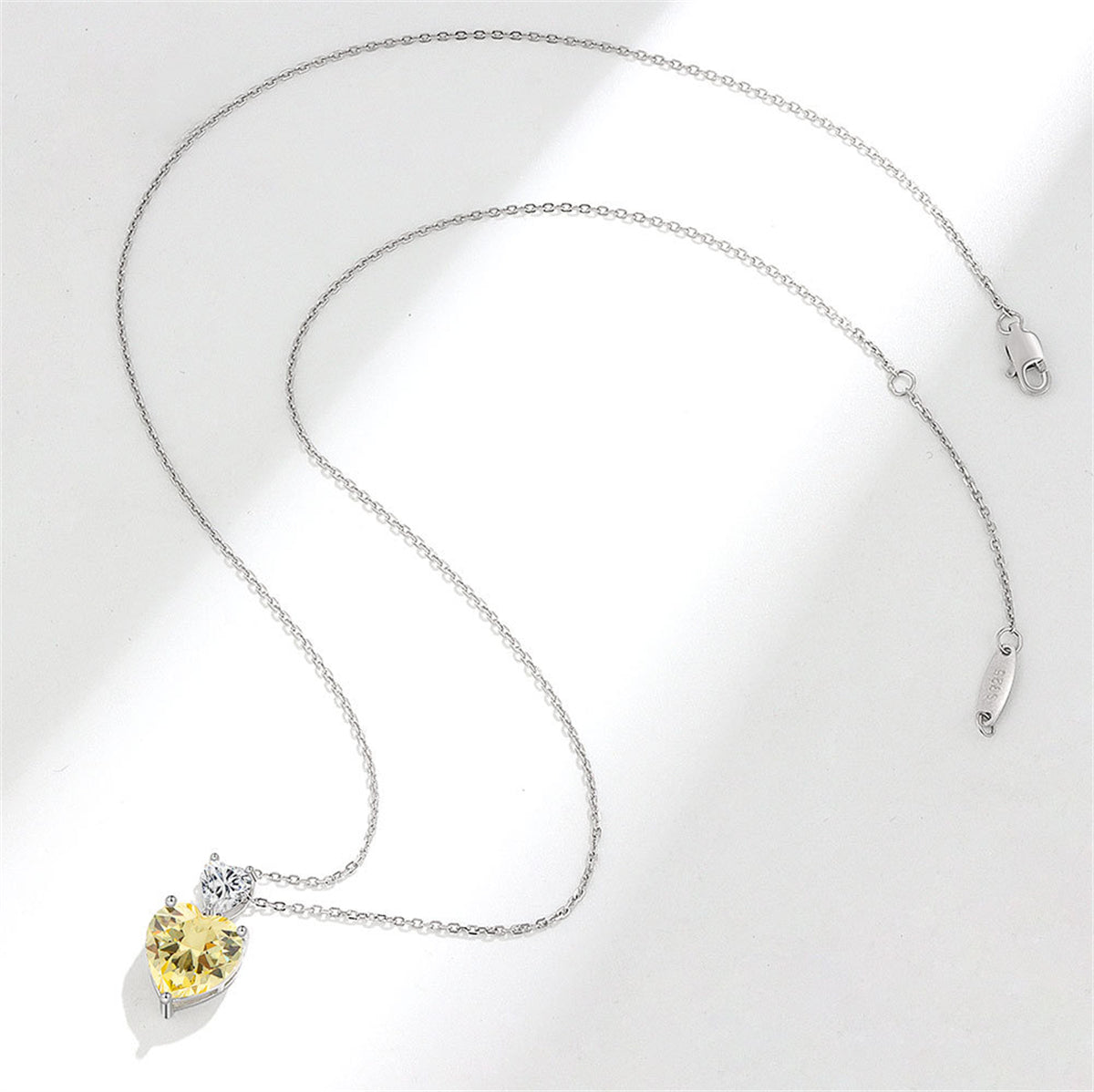 Yellow Crystal and Silver-Plated Double-Heart Pendant Necklace, silver pendant necklace for women, side view