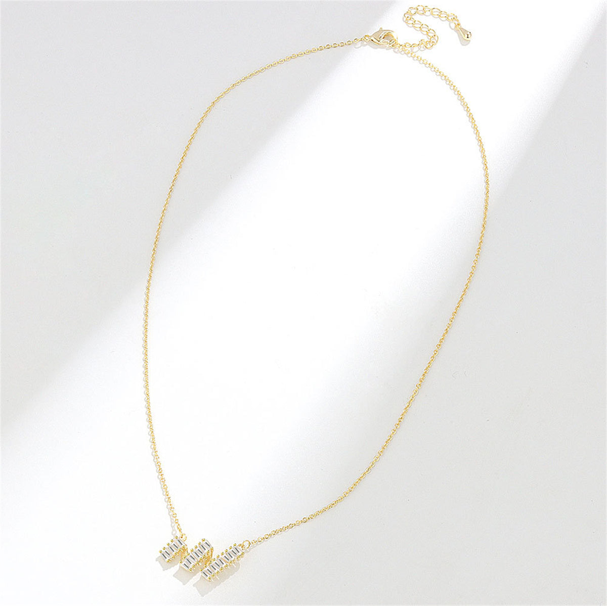 Crystal and 18K Gold-Plated Wave Pendant Necklace, gold pendant necklace for women, botanical inspired, detail close-up