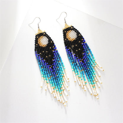 Black and Blue Howlite Sun Tassel Drop Earrings, drop earrings for women, dainty minimalist design, side view
