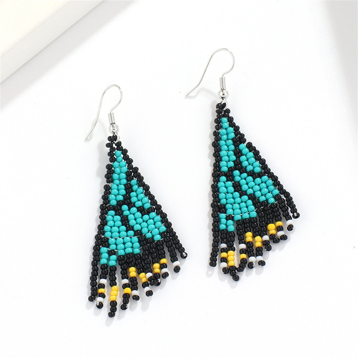 Green and Black Howlite Butterfly Tassel Drop Earrings, drop earrings for women, dainty minimalist design, side view