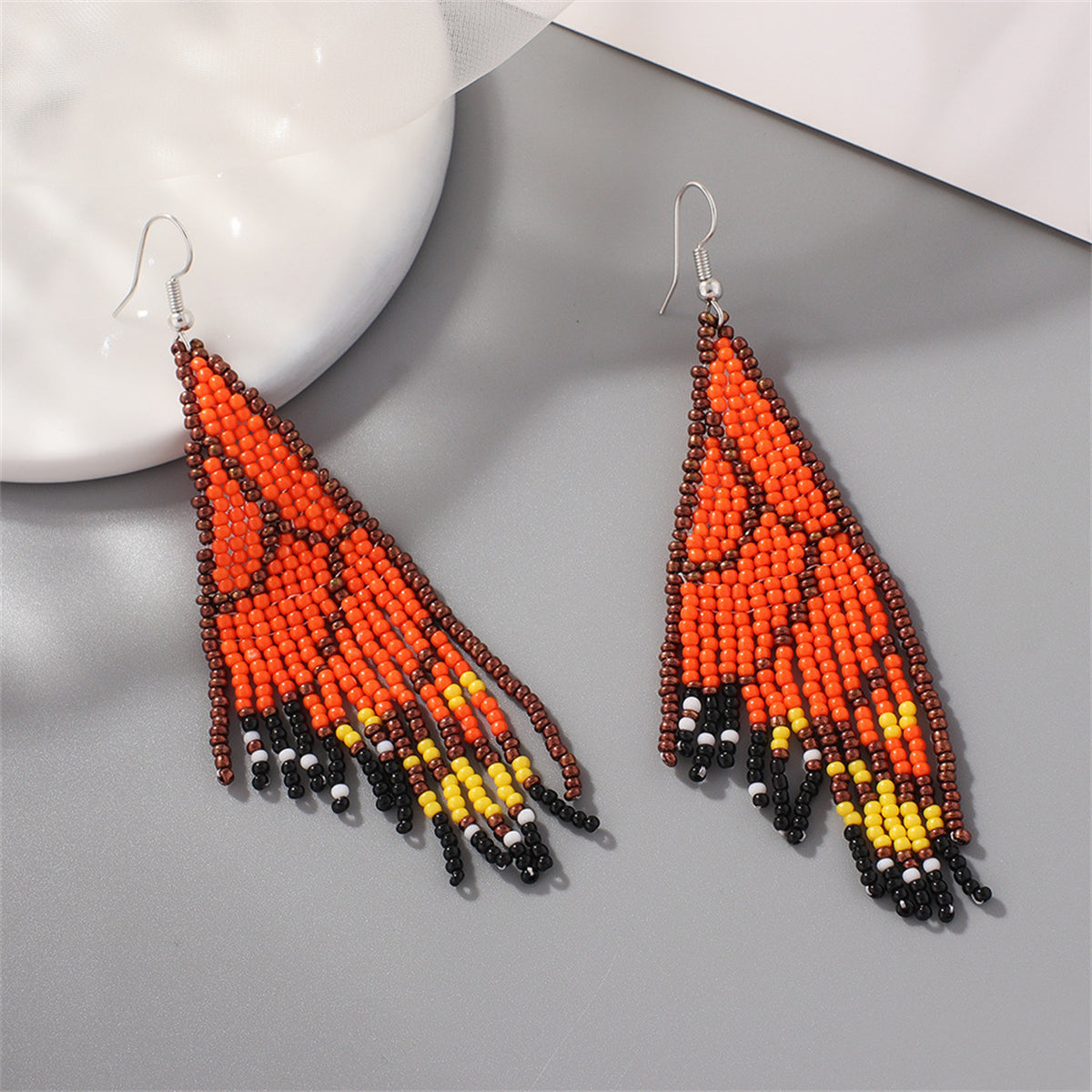 Orange and Black Howlite Butterfly Tassel Drop Earrings, drop earrings for women, vintage-inspired design, lifestyle look