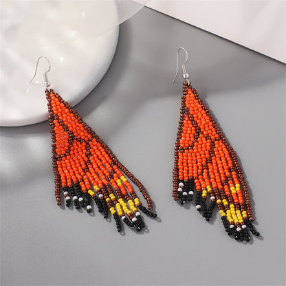 Orange and Black Howlite Butterfly Tassel Drop Earrings, drop earrings for women, vintage-inspired design, lifestyle look