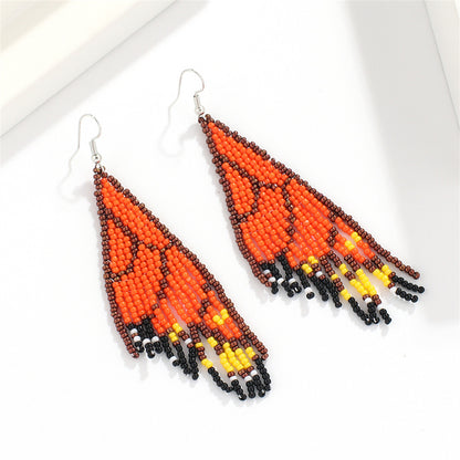 Orange and Black Howlite Butterfly Tassel Drop Earrings, drop earrings for women, vintage-inspired design, side view