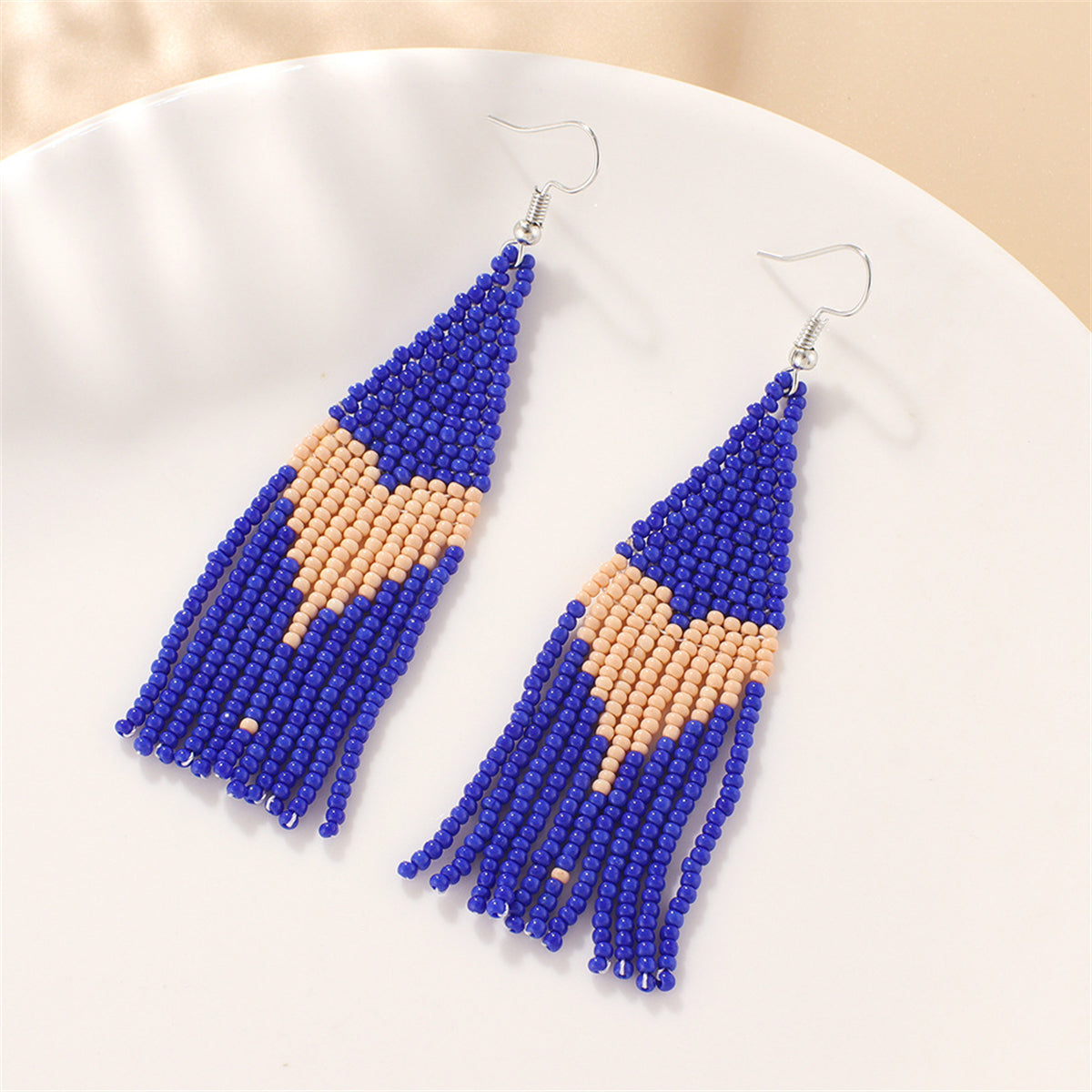 Blue Howlite and Silver-Plated Heart Tassel Drop Earrings, silver drop earrings for women, botanical inspired, side view