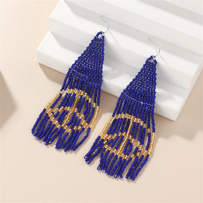 Blue and White Howlite Peace Sign Tassel Drop Earrings, drop earrings for women, vintage-inspired design, side view