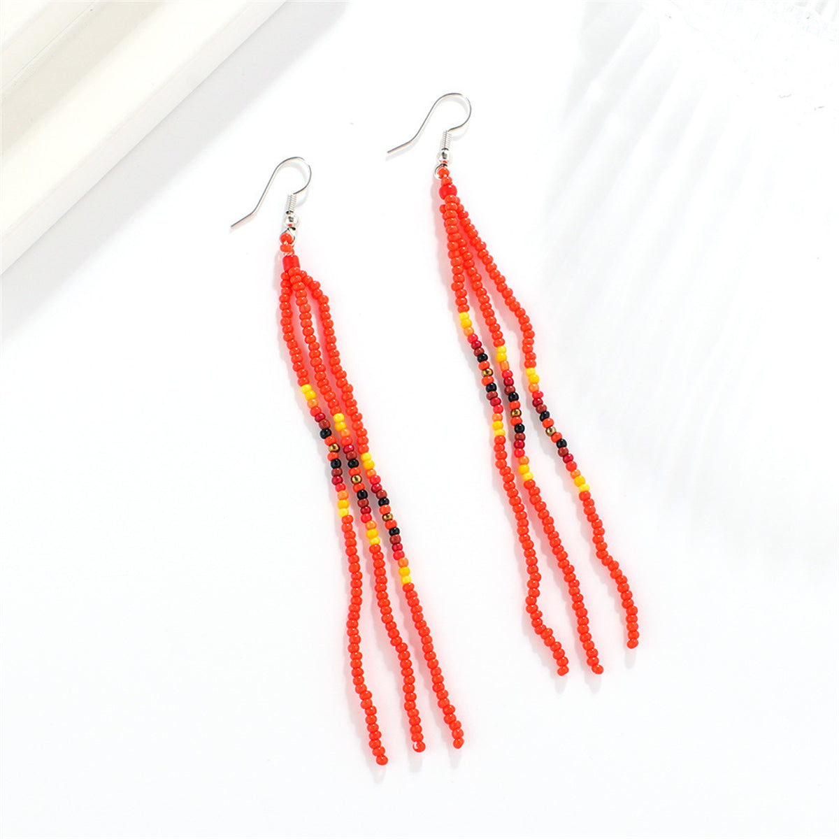 Red Howlite and Silver-Plated Tassel Drop Earrings, silver drop earrings for women, dainty minimalist design, side view