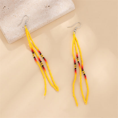 Yellow Howlite and Silver-Plated Tassel Drop Earrings, silver drop earrings for women, dainty minimalist design, side view