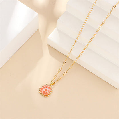 Red Acrylic and 18K Gold-Plated Ladder Pendant Necklace, gold pendant necklace for women, everyday style, detail close-up
