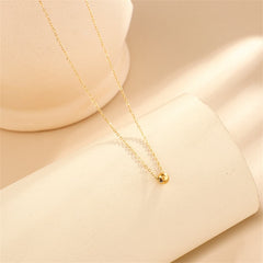 Beautiful 18K gold-plated bead pendant necklace featured on a chain, radiating sophistication and timeless style.
