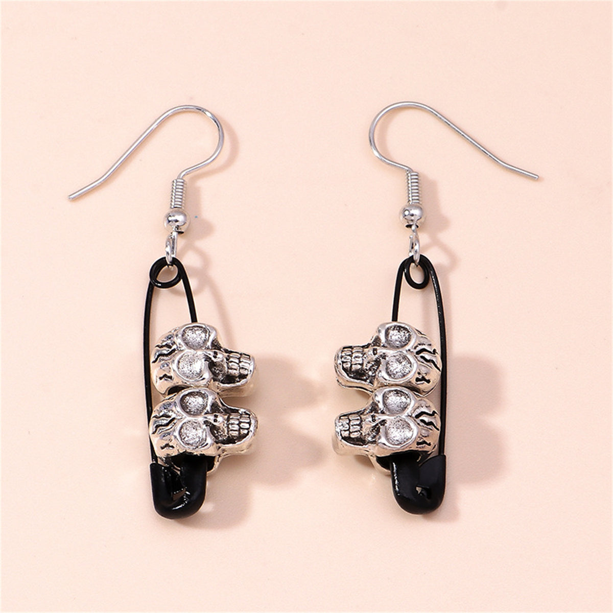 Black and Silver-Plated Skull Pin Drop Earrings, silver drop earrings for women, dainty minimalist design, front view