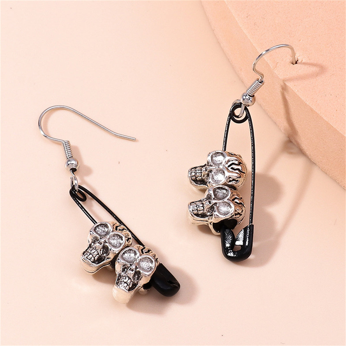 Black and Silver-Plated Skull Pin Drop Earrings, silver drop earrings for women, dainty minimalist design, side view