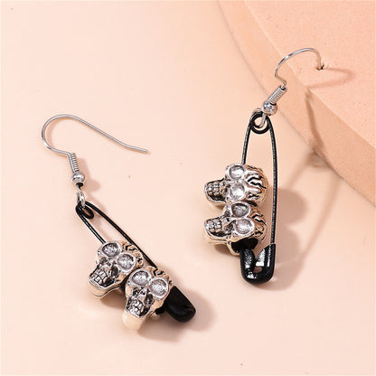 Black and Silver-Plated Skull Pin Drop Earrings, silver drop earrings for women, dainty minimalist design, side view