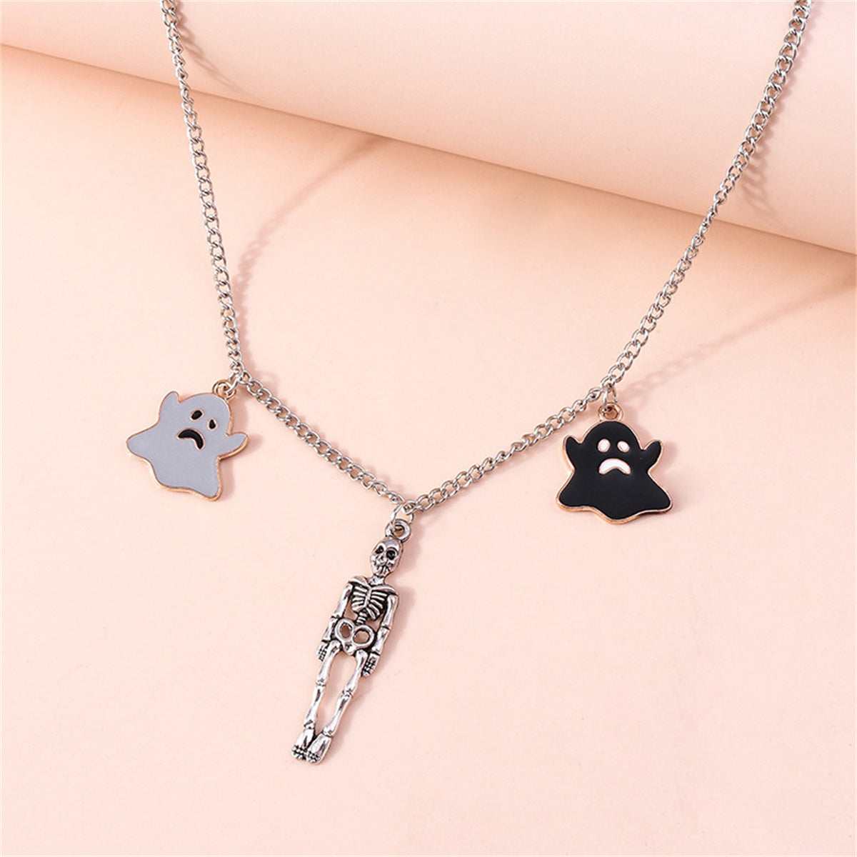 Black Enamel and Silver-Plated Ghost Skeleton Pendant Necklace, silver pendant necklace for women, side view