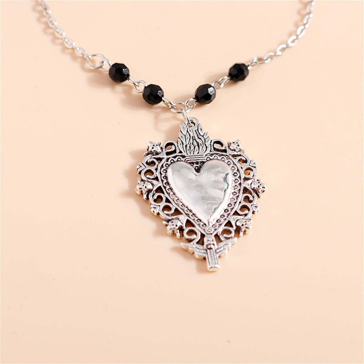 Black Acrylic and Silver-Plated Floral Heart Pendant Necklace, silver pendant necklace for women, everyday style, side view