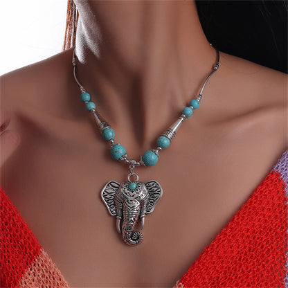Turquoise and Silver-Plated Elephant Pendant Necklace, silver pendant necklace for women, botanical inspired, front view