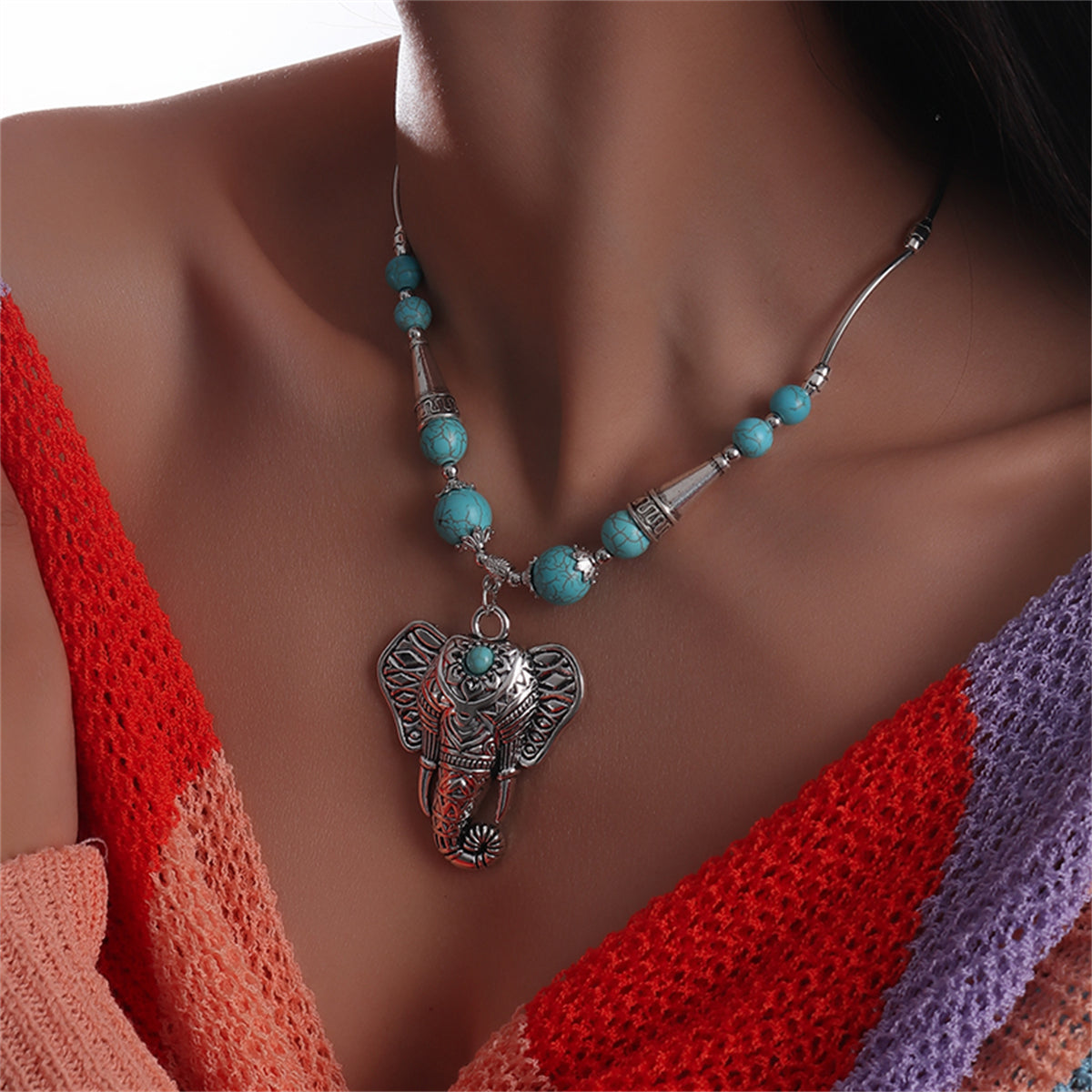 Turquoise and Silver-Plated Elephant Pendant Necklace, silver pendant necklace for women, botanical inspired, side view