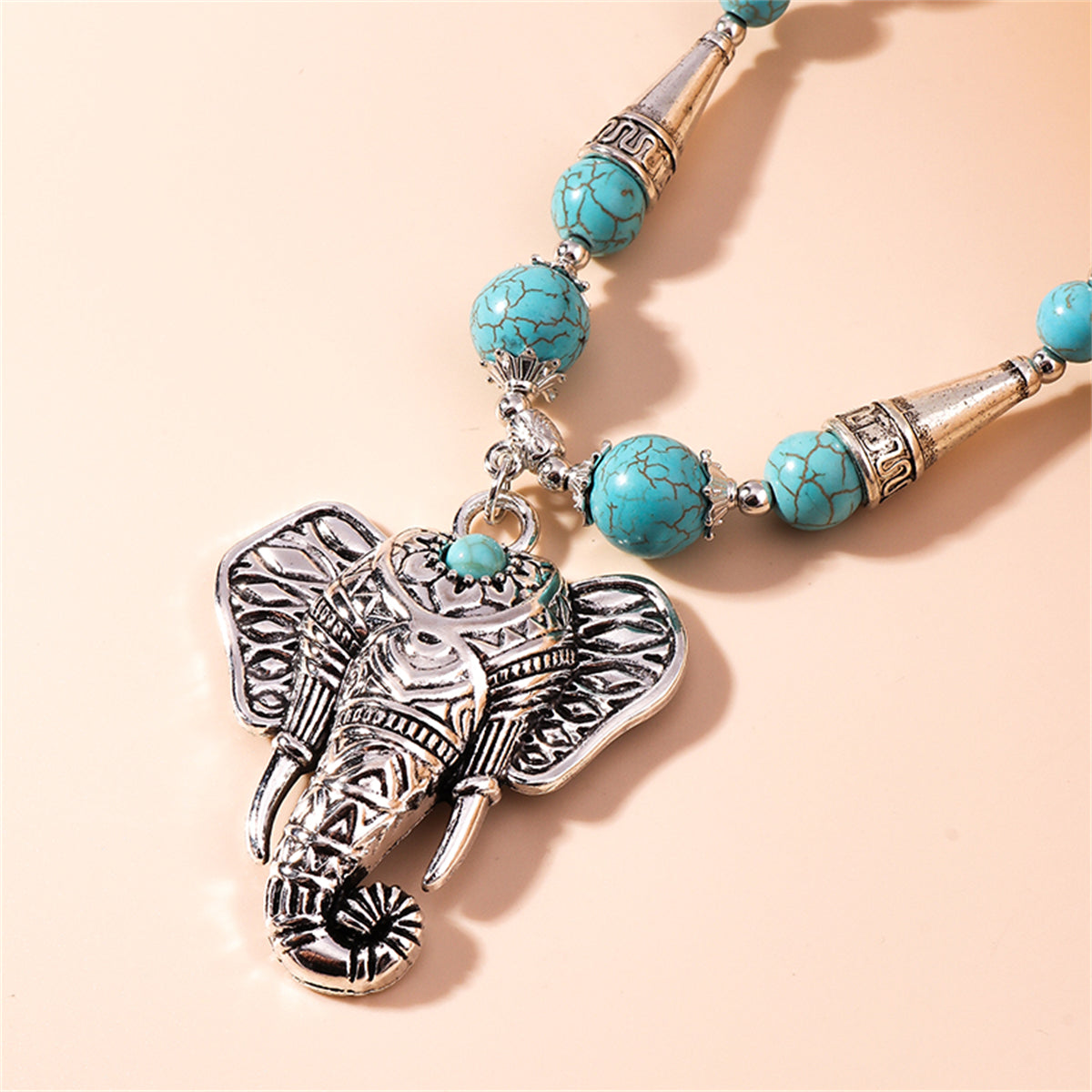 Turquoise and Silver-Plated Elephant Pendant Necklace, silver pendant necklace for women, botanical inspired, lifestyle look