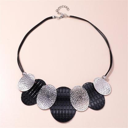 Black Polystyrene and Silver-Plated Oval Statement Necklace, silver pendant necklace for women, front view