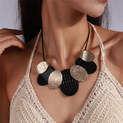 Black Polystyrene and 18K Gold-Plated Oval Statement Necklace, gold pendant necklace for women, side view