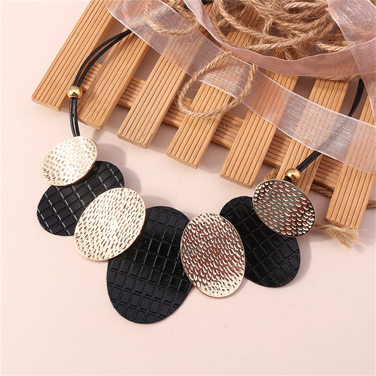 Black Polystyrene and 18K Gold-Plated Oval Statement Necklace, gold pendant necklace for women, detail close-up
