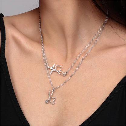 Silver-Plated Heartbeat and Stethoscope Pendant Layered Necklace, silver pendant necklace for women, side view