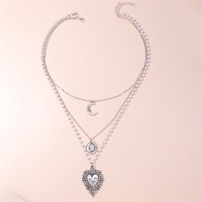 Pearl and Silver-Plated Moon Sun Heart Pendant Layered Necklace, jewelry gift sets for women, botanical inspired, styled look