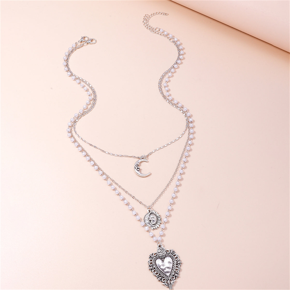 Pearl and Silver-Plated Moon Sun Heart Pendant Layered Necklace, jewelry gift sets for women, detail close-up