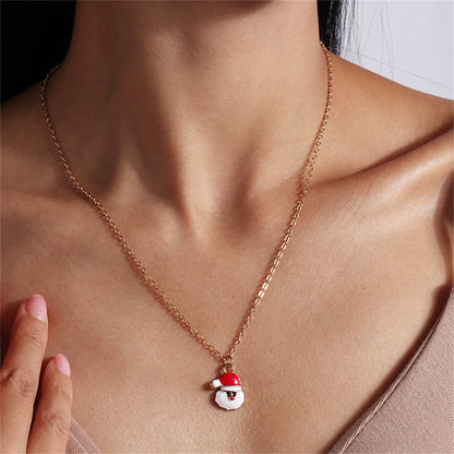 Red Enamel and 18K Gold-Plated Santa Pendant Necklace, gold pendant necklace for women, dainty minimalist design, front view