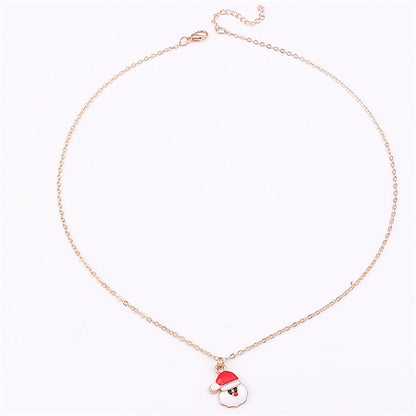 Red Enamel and 18K Gold-Plated Santa Pendant Necklace, gold pendant necklace for women, dainty minimalist design, side view