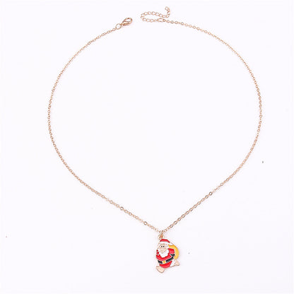 Yellow Enamel and 18K Gold-Plated Santa Pendant Necklace, gold pendant necklace for women, vintage-inspired design, side view