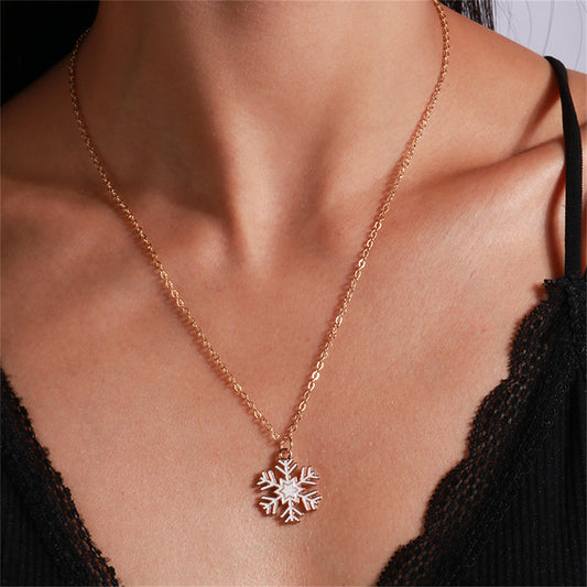 White Enamel and 18K Gold-Plated Snowflake Pendant Necklace, gold pendant necklace for women, botanical inspired, front view