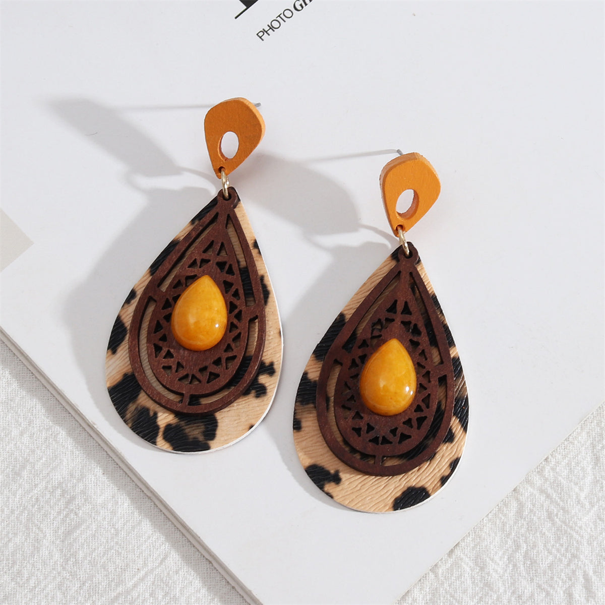 Yellow Resin and Wood Leopard Teardrop Earrings, drop earrings for women, botanical inspired, front view