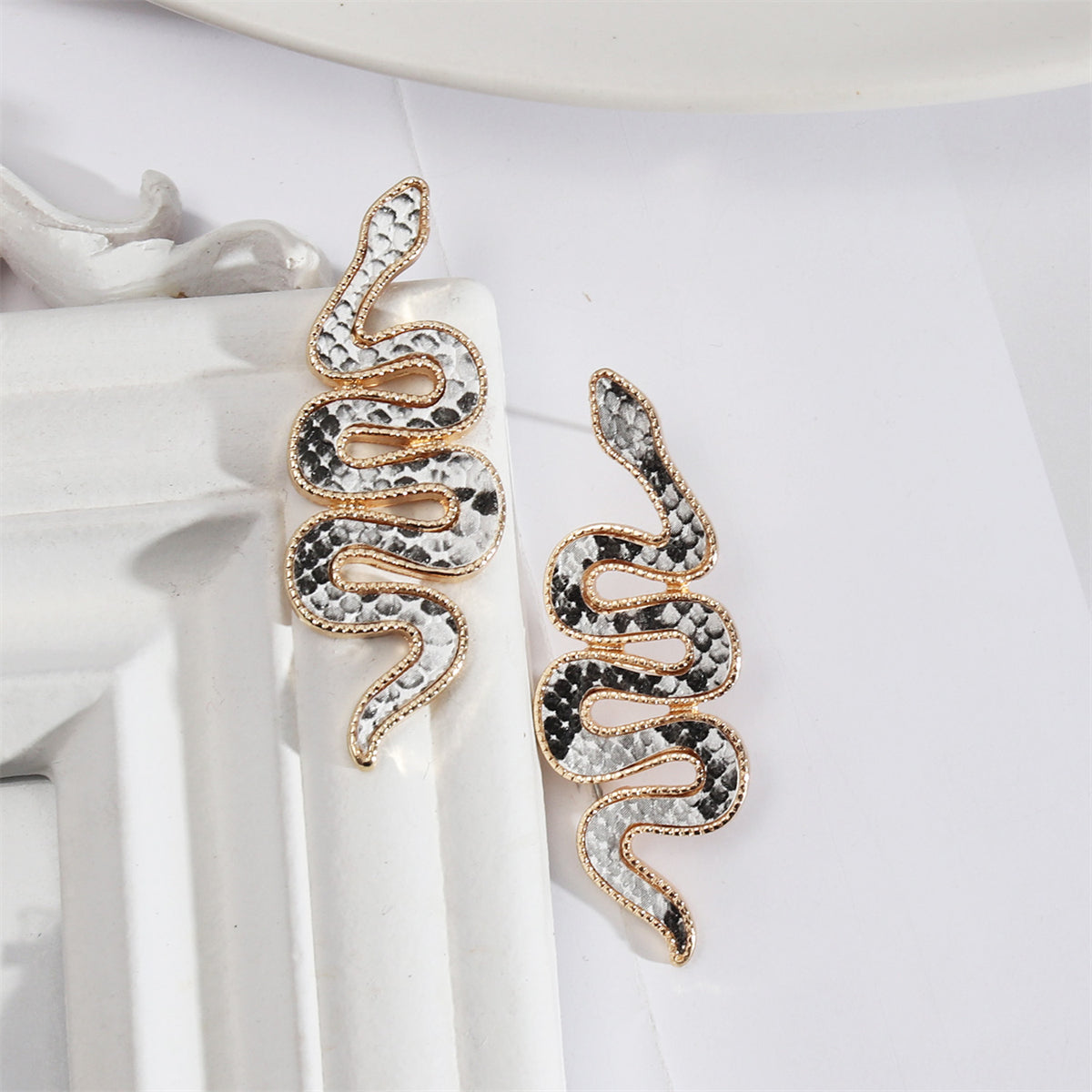 Black Polyurethane and 18K Gold-Plated Snake Drop Earrings, gold stud earrings for women, detail close-up