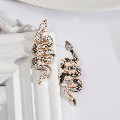Black Polyurethane and 18K Gold-Plated Snake Drop Earrings, gold stud earrings for women, detail close-up