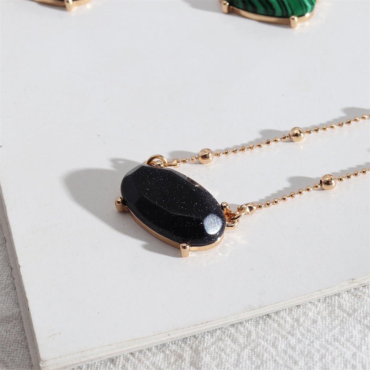 Blue Quartz and 18K Gold-Plated Oval Pendant Necklace, gold pendant necklace for women, botanical inspired, side view