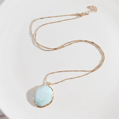 Light Blue Turquoise and 18K Gold-Plated Oval Pendant Necklace, gold pendant necklace for women, side view